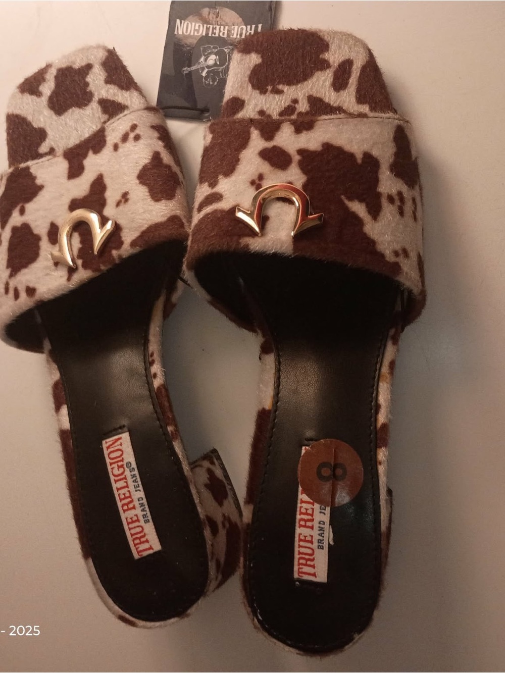 True Religion Brown and Cream Cowhide Mule Slides with Gold Accent